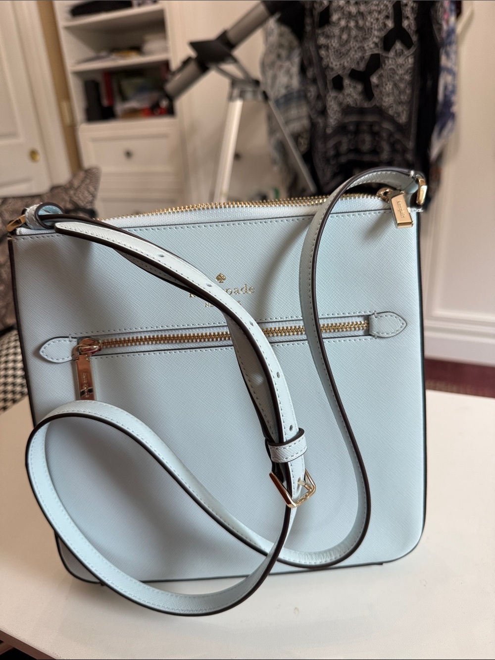 Kate Spade light blue zip top crossbody 8.5” x 9.5” NWOT.  Never carried